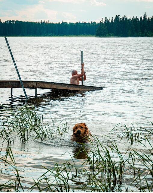 A swim at the dock, dog included