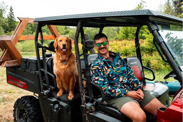 Gretsch riding shotgun in the side-by-side