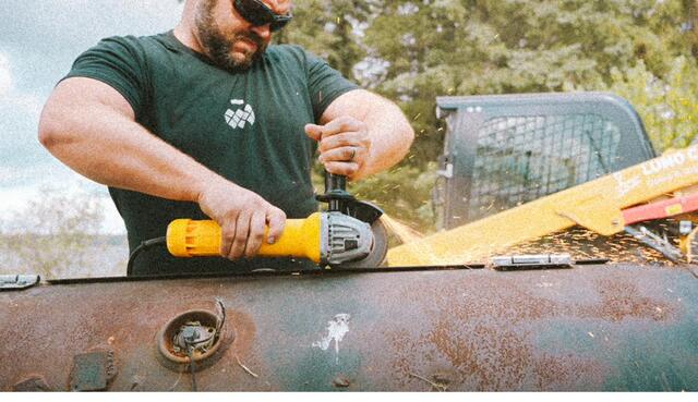 Sparks flying off the grinder during fabrication