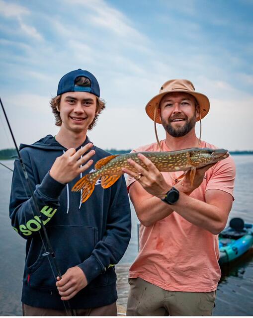 A jack held up for the camera, fresh from the lake