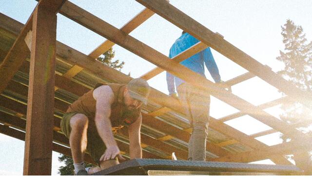 Setting rafters on the gazebo frame